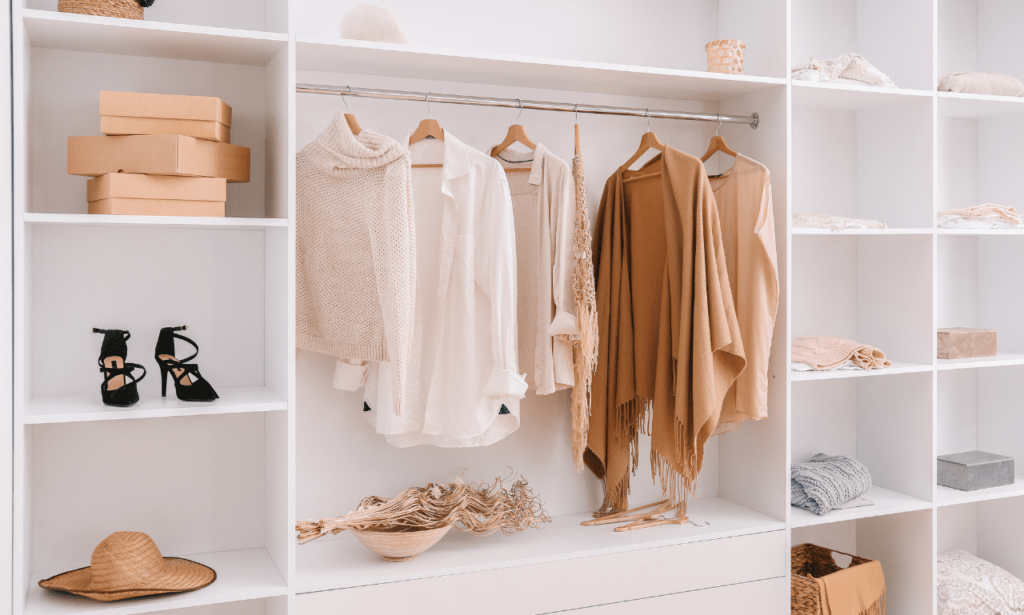 Women's work wardrobe display featuring neutral colors for a professional look.