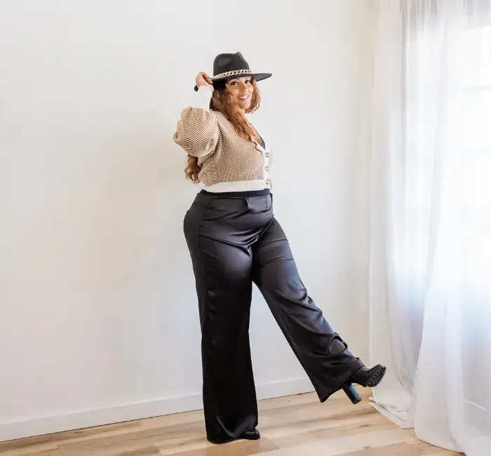 Plus Size Fashion Model Standing Near the Window