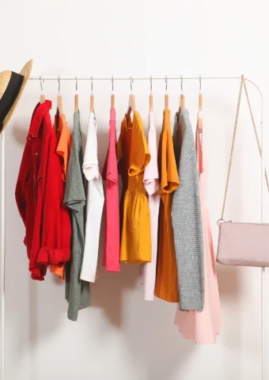 A neatly organized capsule wardrobe showcasing a reduced collection of clothing items, illustrating effective capsule wardrobe tips for creating a versatile and timeless style.