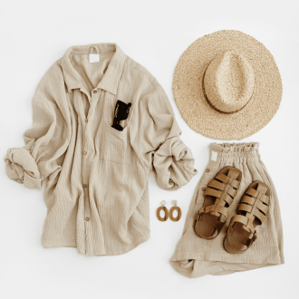 Sustainable summer capsule wardrobe: Aesthetic fashion composition with female clothes and accessories. Flat lay, top view.