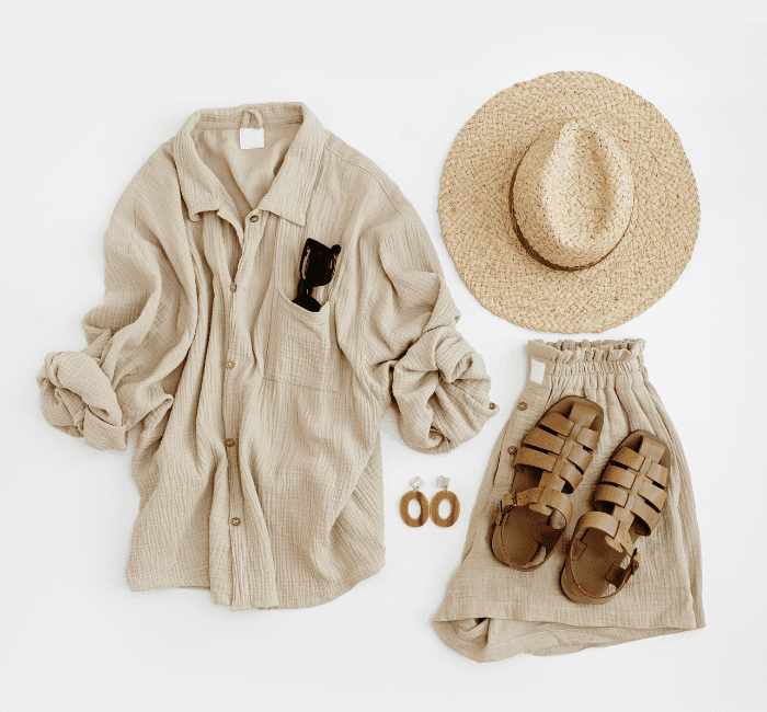 Sustainable summer capsule wardrobe: Aesthetic fashion composition with female clothes and accessories. Flat lay, top view.