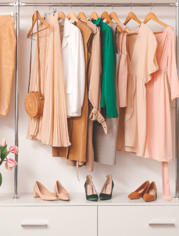 Modern wardrobe featuring stylish spring clothes and accessories, arranged using how to organize your closet tips